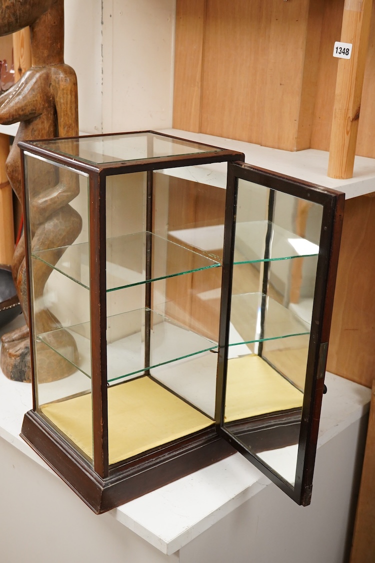 An early to mid 20th century glass display cabinet, 52cm